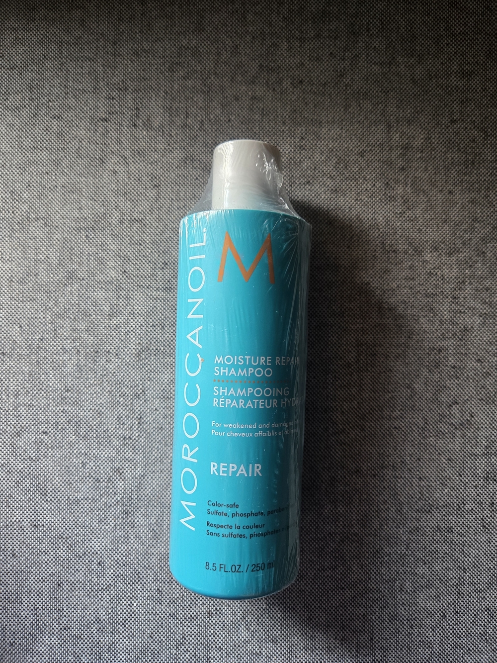 Moroccanoil Repair Shampoo - Bright Turquoise Bottle with Orange Logo